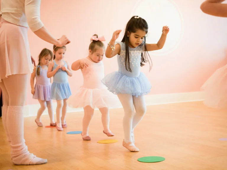 Little dancers tiptoeing in ballet class at Tutu School