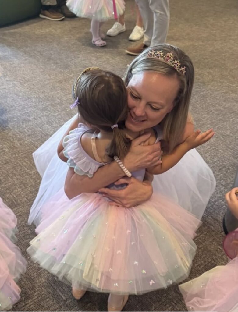 Teacher Kimberlyn with a tiny dancer