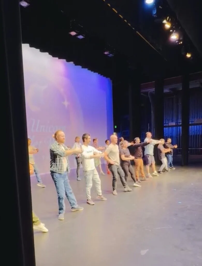 Dads dancing on stage
